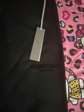 Fear of God ESSENTIALS Black Embossed Logo Sweatshirt